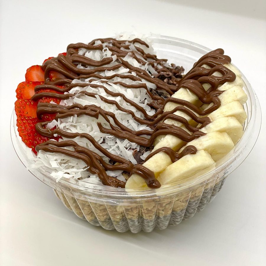Crepe drizzled with Nutella, banana and strawberries